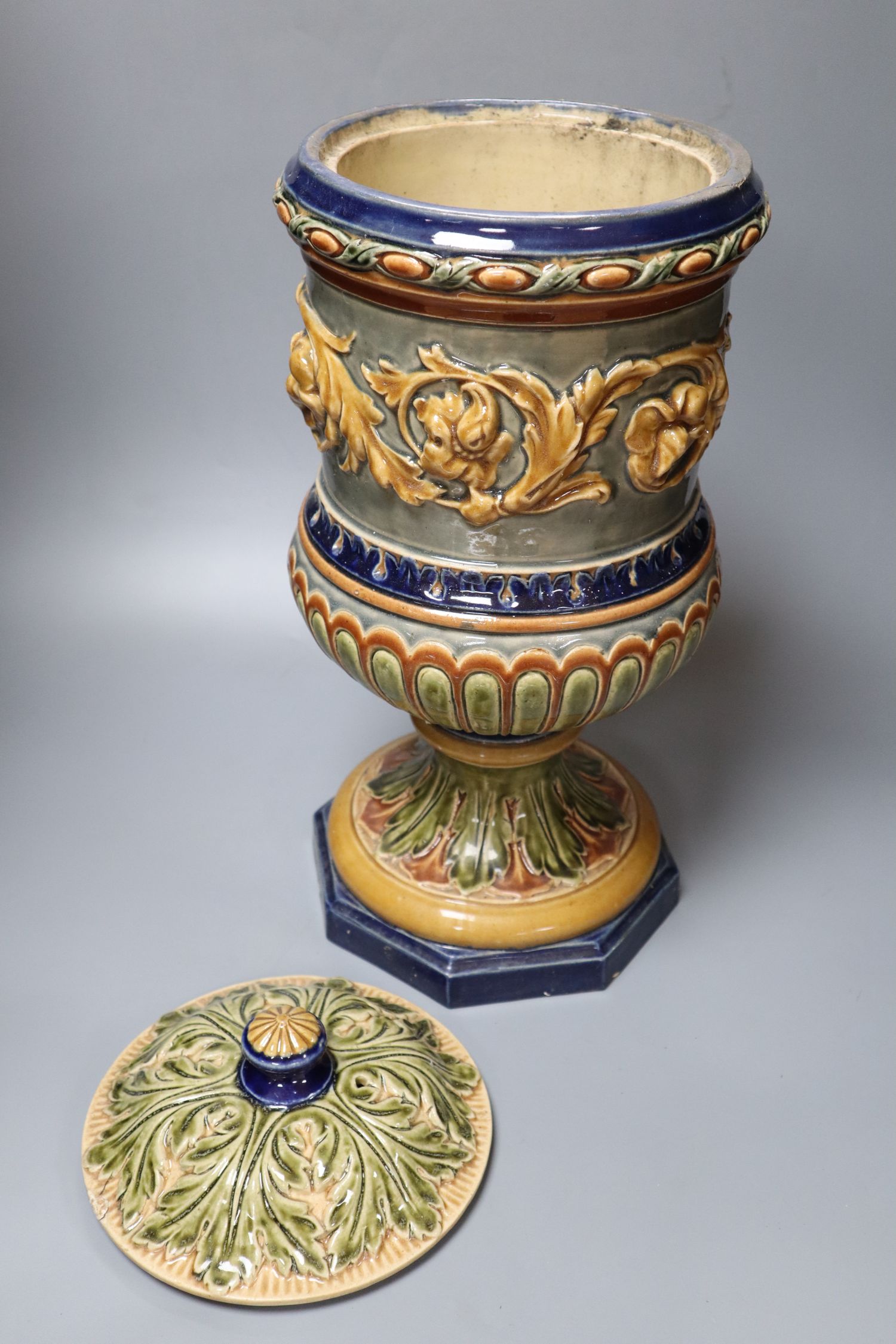 A 19th century glazed stoneware water filter, with cover, 48cm